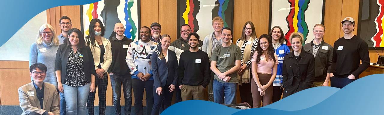 A group of students and their mentors at the 77 Idea Lab Mentor Madness event.